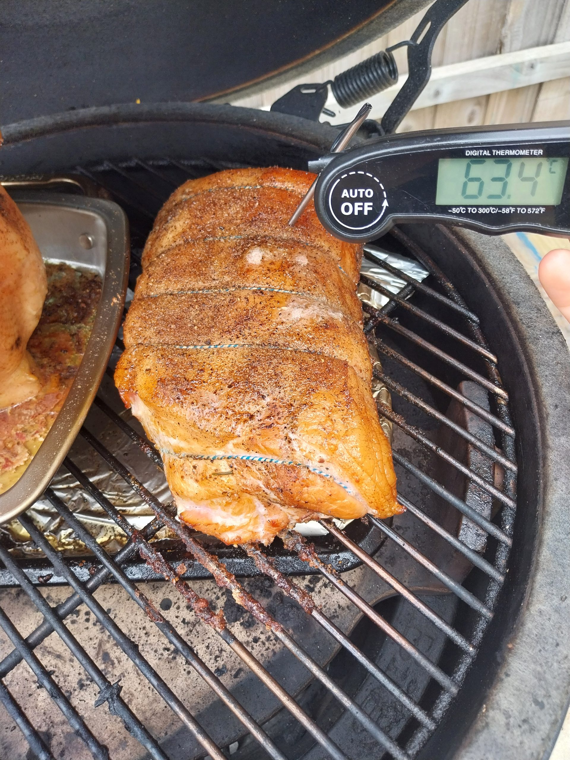Probe reading 63.4°C on a pork loin cooked on the BGE Large