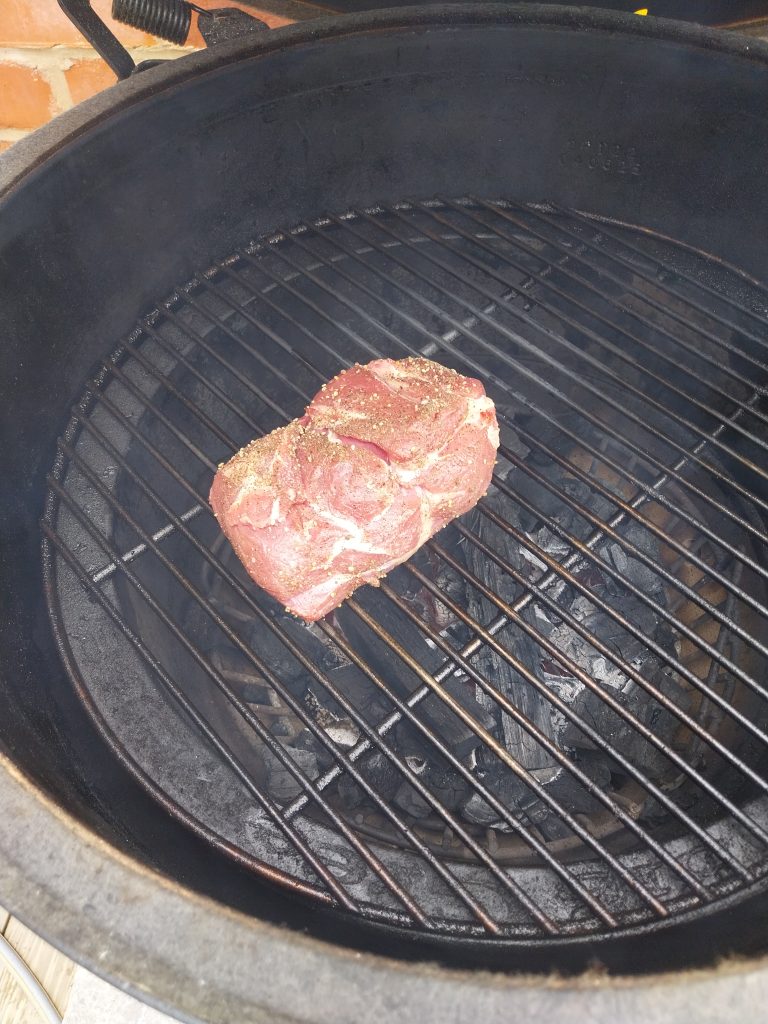 Raw lamb rump on the BGE Large grate pre-cook, alternate angle — 31 May 2026