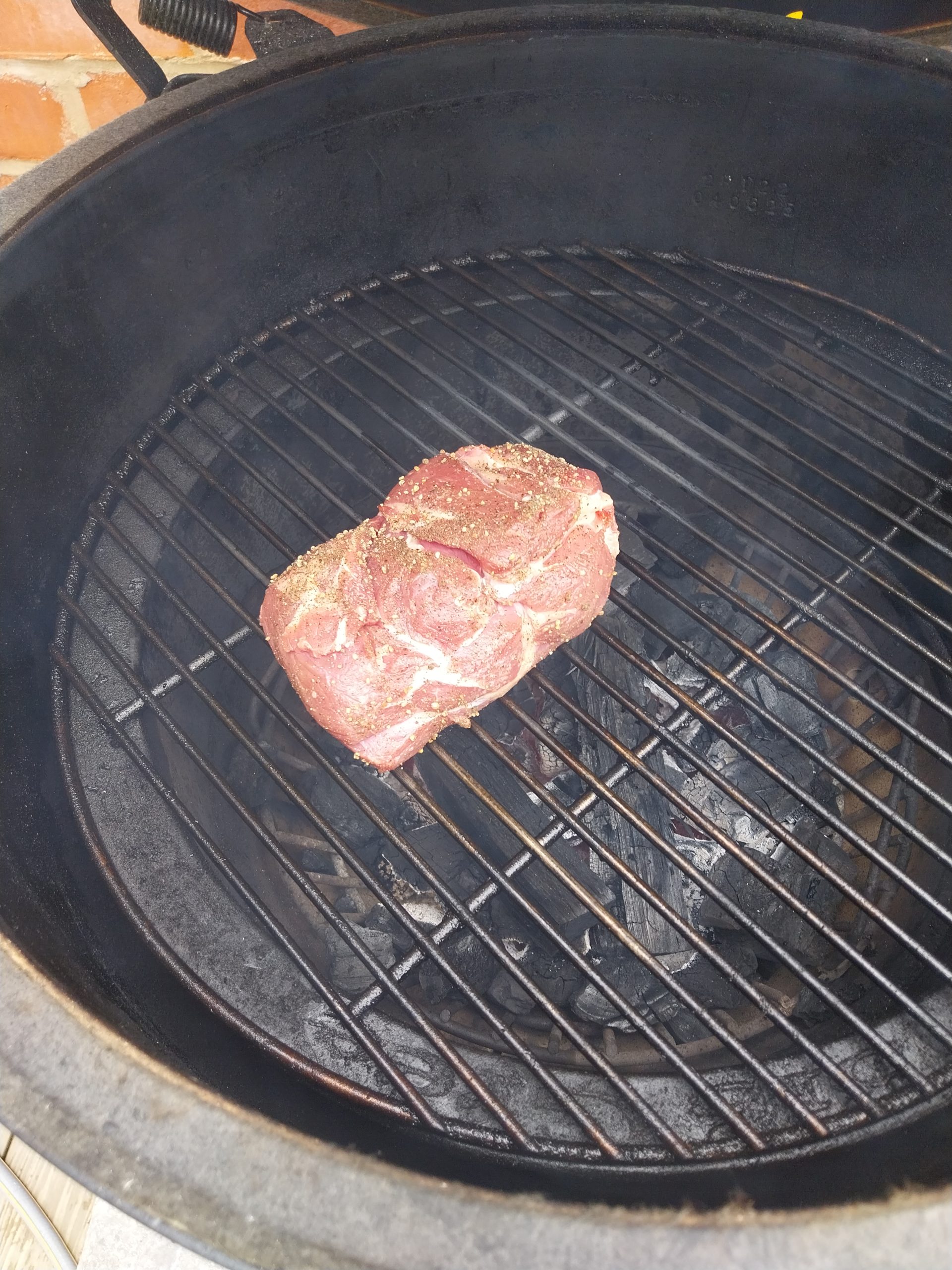 Raw lamb rump on the BGE Large grate, sat fat-cap-down on the bars, just before the cook — 31 May 2026