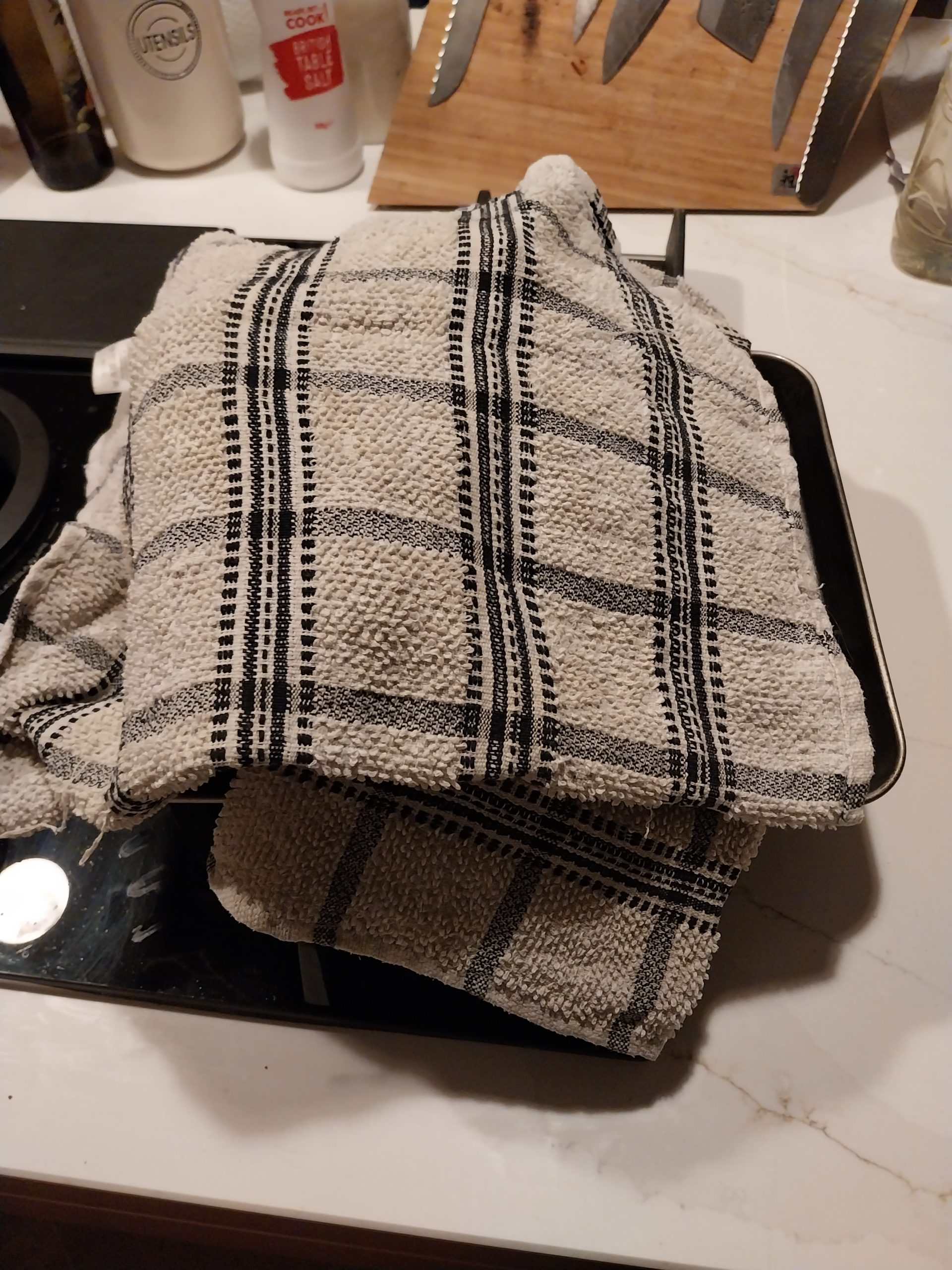 Pork shoulder double-wrapped in heavy-duty foil ready for the overnight faux-cambro rest in a cold oven on a stack of clean tea towels — bedtime had arrived but the joint was already at probe-tender.