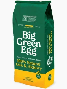 Big Green Egg Premium 100% Natural Oak & Hickory Lump Charcoal in its branded bag.