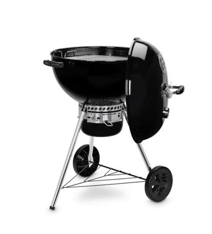 Weber Master-Touch GBS 57cm Tuck-Away lid mechanism — the standard removable non-hinged lid slid off the bowl and parked upright in its side-holder during a cook.