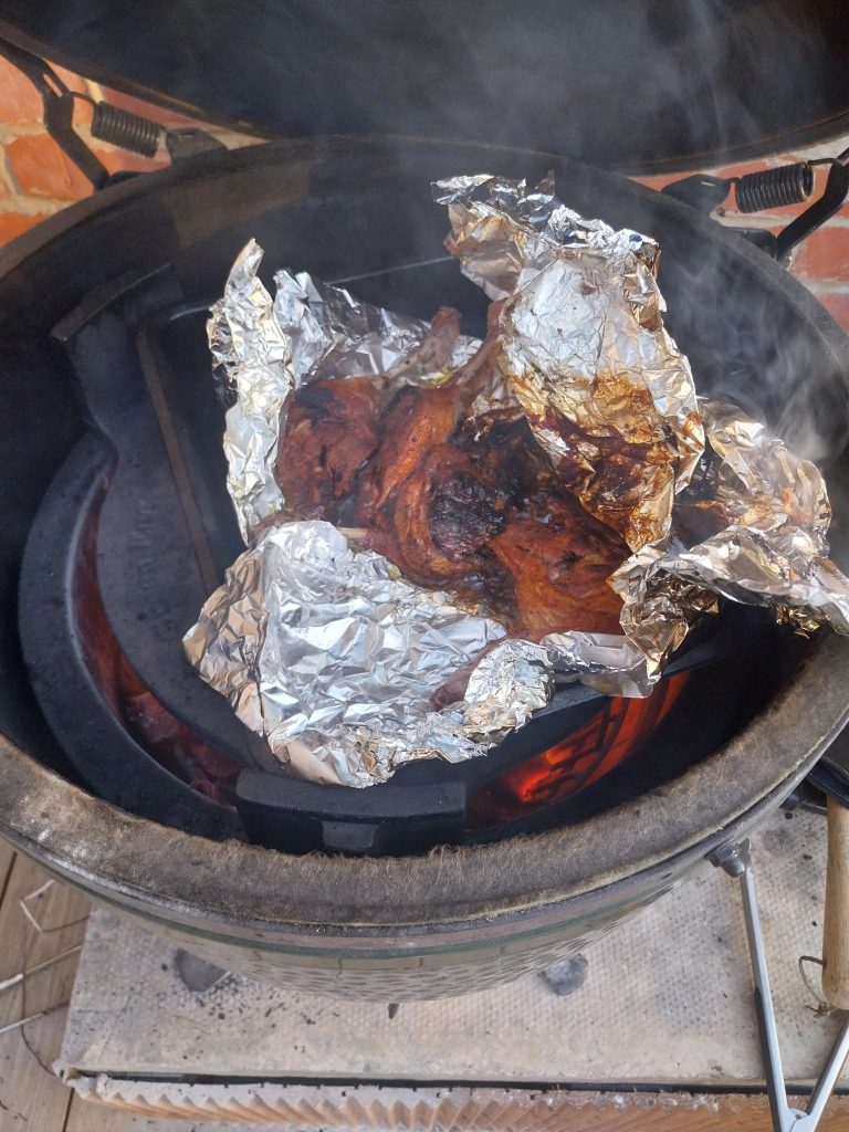 The same duck legs flipped over so the side that had been above the oil goes under it