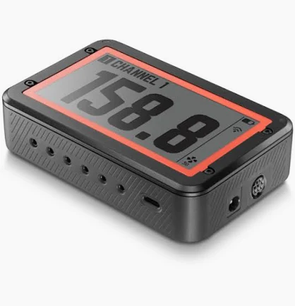 FireBoard 2 Drive: the graphite controller three-quarter on, large monochrome display above a row of probe ports along the front edge.