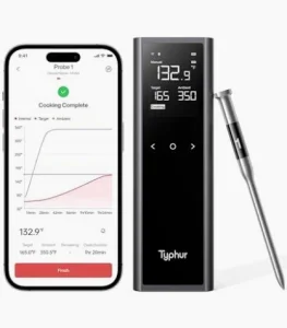 Typhur Sync Gen 2 — the tall black base with its own LCD and a single probe alongside, shown next to a phone running the Typhur app. Image: Typhur.
