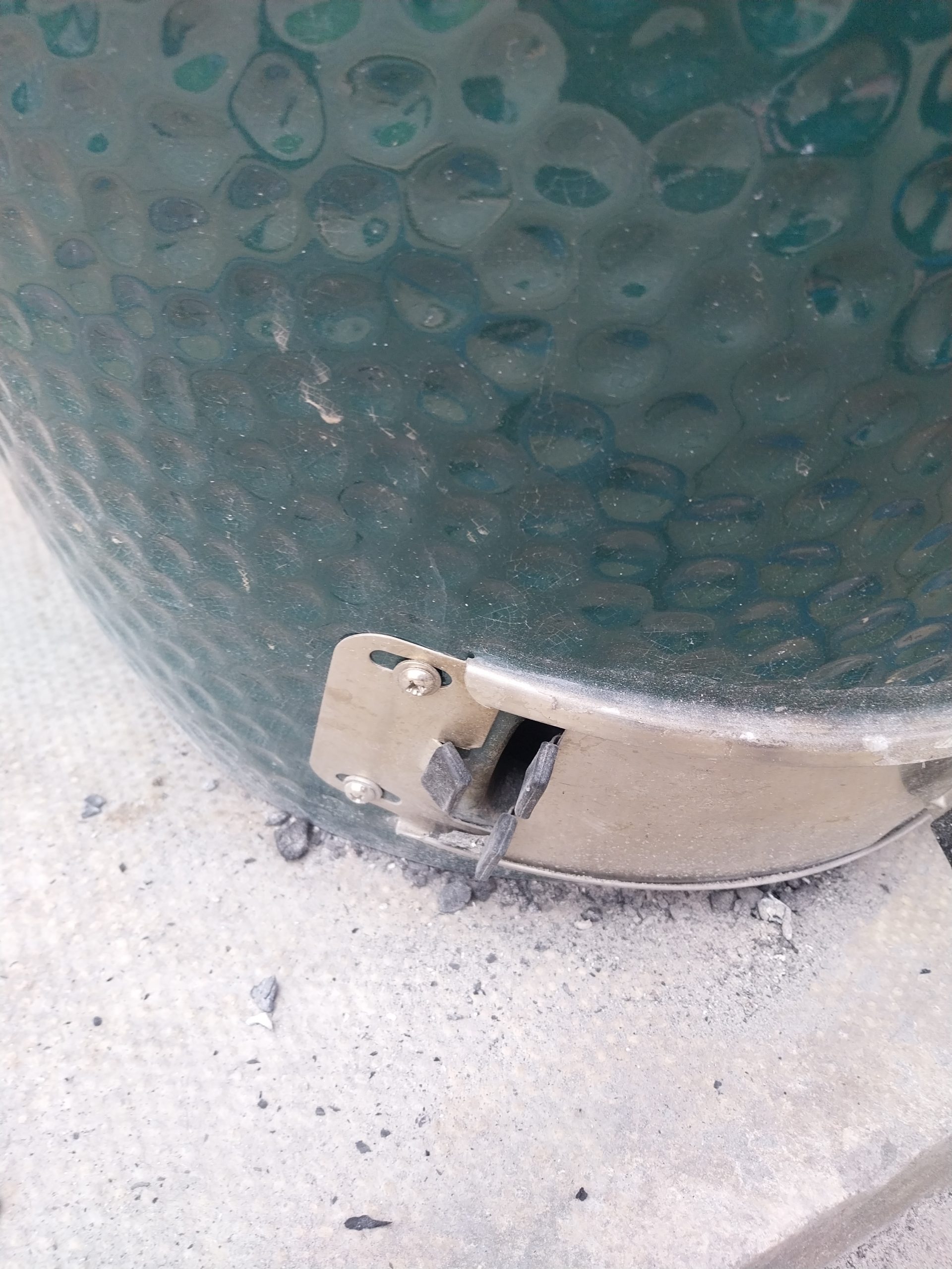 The bottom vent slider on the BGE Large open a sliver, the setting that holds a low-and-slow temperature