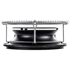Kamado Joe Classic Slo-Roller — a black spiral heat diffuser with curved vanes, sitting beneath a stainless steel cooking grate, photographed side-on