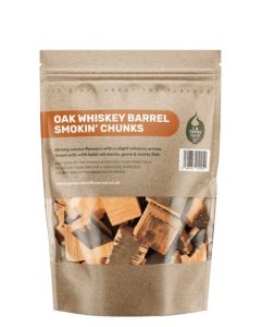 A bag of Mokutan Oak Whiskey Barrel Smokin' Chunks, with the chunks showing through the window, on a white background. Image: Mokutan.